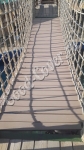 Подвесной мост с использованием террасной доски ДПК Good Cover цвет кофе с молоком