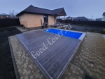 Скрытый бассейн с раздвижной террасой из террасной доской ДПК Good Cover Стандарт венге