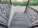 Укладка террасной доски и ступеней из ДПК Good Cover на веранде с лестницей